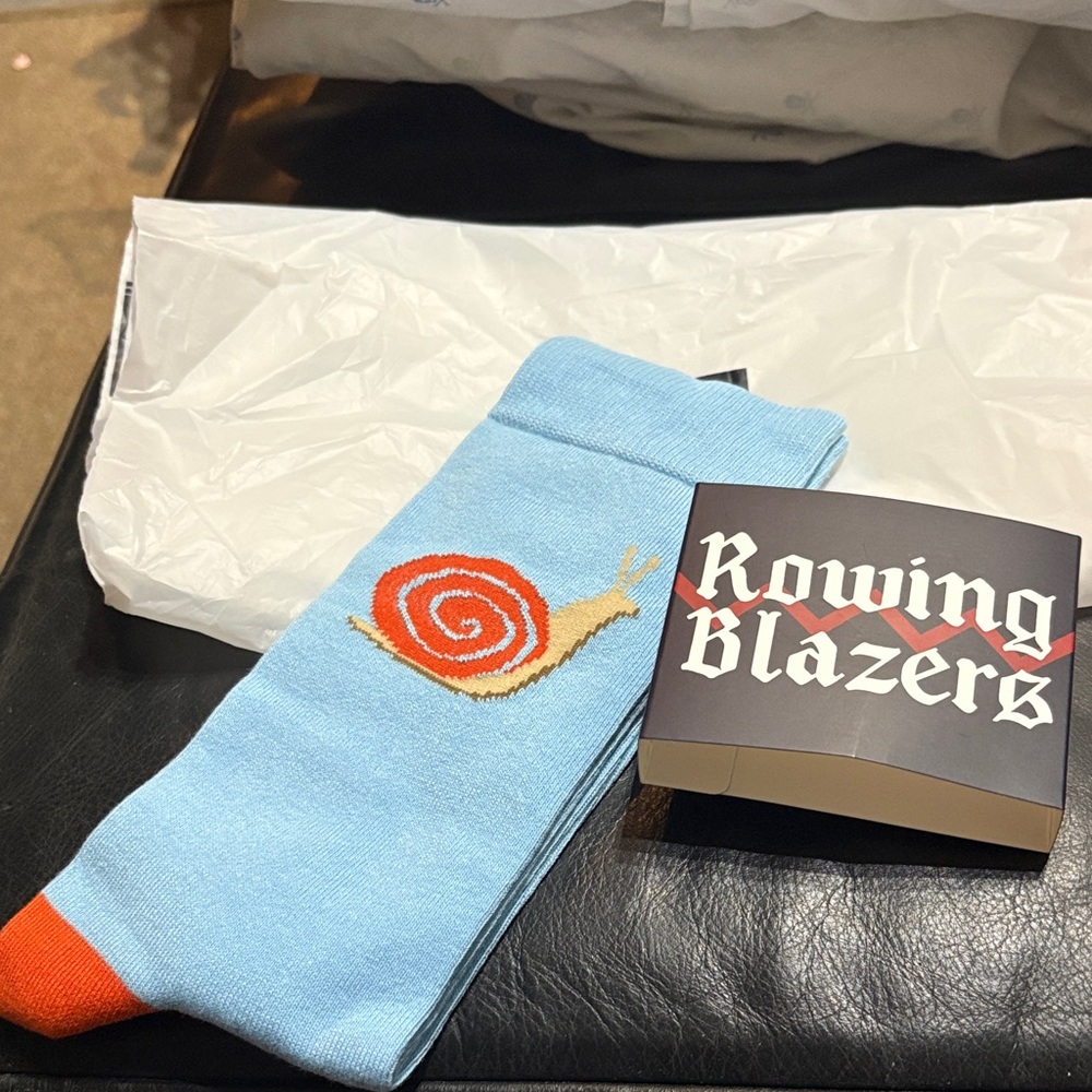 Rowing Blazers Blue Socks with Orange Snail Design
